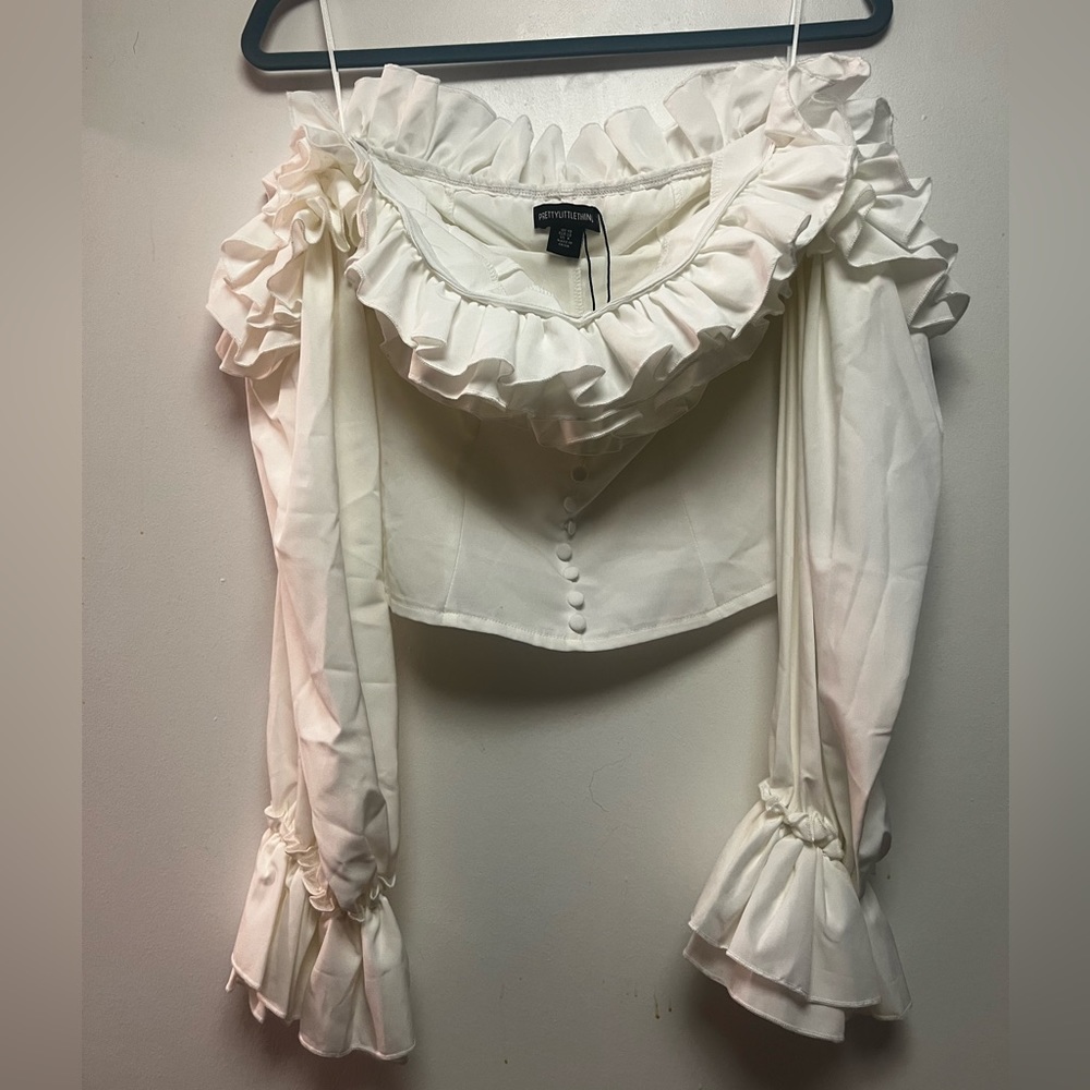 White ruffle off shoulder top